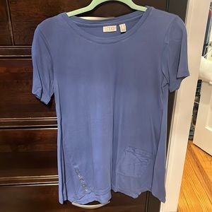 LOGO top with button and pocket detail. Size XS blue